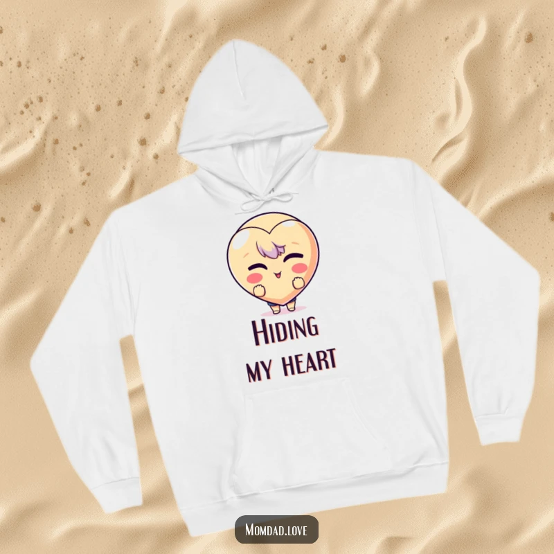 Funny Hoodie: Character peeking from behind a winking heart emoji, offering warmth and a touch of playful humor.