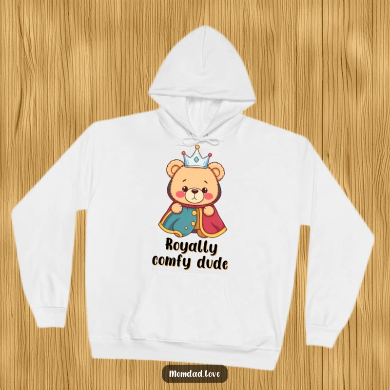 Funny hoodie with a bewildered teddy bear donning a small crown and elaborate royal robe, exuding cozy, comical royalty.
