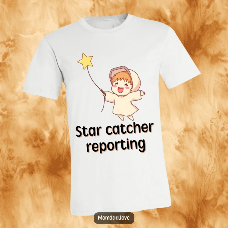 Funny T-shirt showcasing a happy figure using a net to catch a bright, falling star, representing aspirations and dreams.